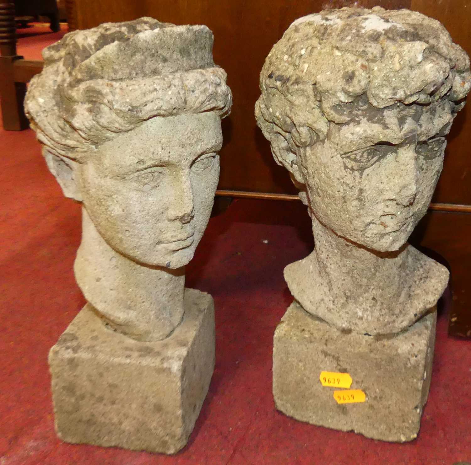A classical style ladies and gents concrete pedestal garden bust ornaments, height 32cm