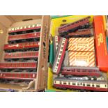 Two trays of Triang and Hornby 00 passenger and rolling stock, some boxed and others loose