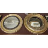 Two similar Regency giltwood circular wall mirrors, and a Regency giltwood circular mirror frame