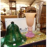 A green moulded glass bell shaped cloche, together with a heavy pink cased glass knopped pedestal