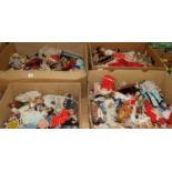 Four boxes of dolls from around the world