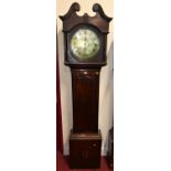 An early 19th centruy oak and mahogany cross banded longcase clock, the circular silvered dial