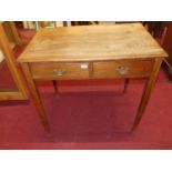 An early 19th century provincial elm two-drawer side table, width 78cm