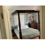 A Victorian mahogany kingsize four-poster bed, having twin base section, cavetto cornice, and