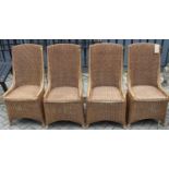 A set of four contemporary wicker conservatory side chairs