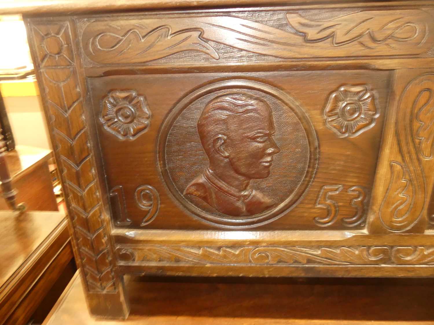A mid-20th century line carved oak twin panelled blanket chest, each panel with Monarchs portrait - Image 3 of 10