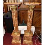 A pair of contemporary rouge veined marble and gilt brass mounted pedestal sculpture stands, each of