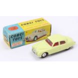 Corgi Toys No. 208S Jaguar 2.4L saloon comprising of lemon yellow body with red interior and spun