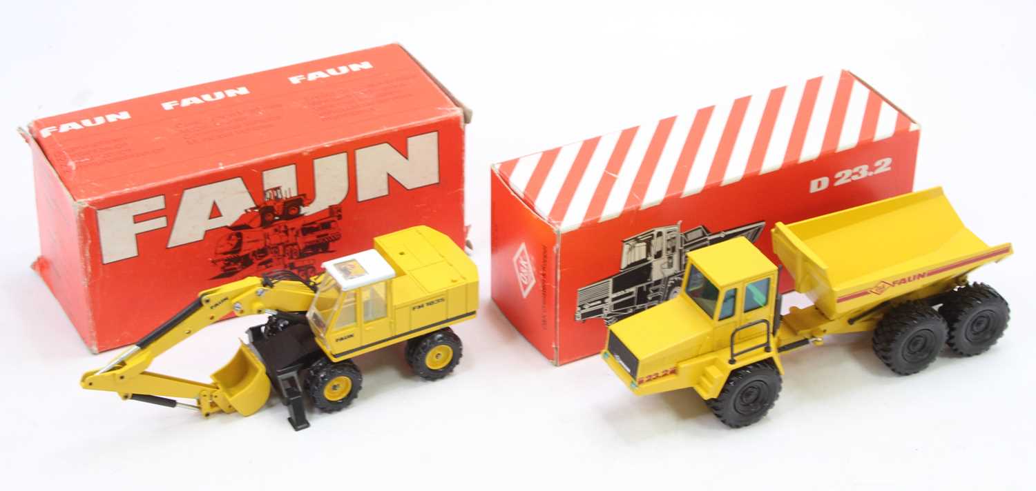 An NZG boxed 1/50 scale Faun construction vehicle group to include an NZG No. 301 O&K D23.2