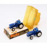 2 Dinky Toys No. 308 Leyland 384 Tractor, both have a blue body, with white hubs, and driver figure,