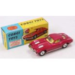 Corgi Toys No. 310 Chevrolet Corvette Stingray, comprising of a metallic pink body with yellow