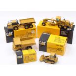 An NZG Caterpillar related diecast group, all 1/50 scale to include No. 413 Caterpillar D250E