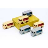 A Dinky Toys No. 30V electric dairy van trade box containing six various examples, three