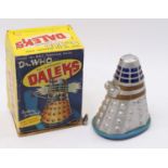 A Marx battery-operated Dalek from the BBC Television Series "Dr Who", silver plastic body with a