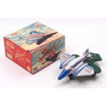 Huki Toys of Western Germany tinplate and clockwork Flying Hops Jet Plane comprising a silver,