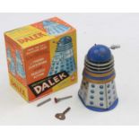 Codeg Doctor Who clockwork mechanical Dalek, with key. Dalek is complete, with weapon and plunger
