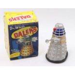 A Marx battery-operated Dalek from the BBC Television Series "Dr Who", silver plastic body with a