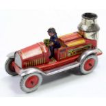 A Distler of Germany tinplate and clockwork steam fire engine comprising a red and yellow printed