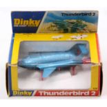 Dinky Toys No. 106 Thunderbird 2 in window style box, model in blue with black base, and red