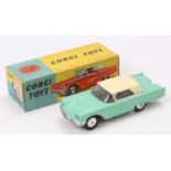 Corgi Toys No. 214 Ford Thunderbird saloon comprising of pale green body with cream hood and spun