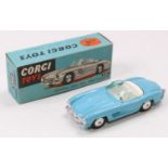 Corgi Toys No. 303 Mercedes Benz 300SL open roadster, comprising of light blue body with white