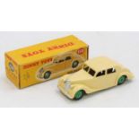 A Dinky Toys No. 158 Riley Saloon comprising of cream body with rare green hubs, housed in the