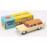 Corgi Toys No. 219 Plymouth Sports Suburban station wagon comprising of cream body with brown