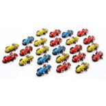 A collection of 24 tinplate and plastic racing cars from a racing game, made in Western Germany