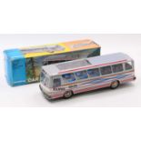 Joustra of France, tinplate and driction drive Euro-Bus, silver and white body with red and blue