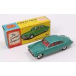 Corgi Toys No. 238 Jaguar MkX comprising of metallic sea green body with red interior and spun hubs,