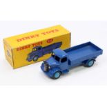 A Dinky Toys No. 412 Austin wagon comprising of dark blue cab and chassis with mid blue hubs