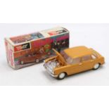 Hover of Hong Kong No. 313 plastic friction drive Austin 1800, orange body with a white interior,