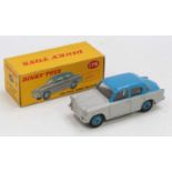 A Dinky Toys No. 175 Hillman Minx comprising of grey and blue body with matching blue Supertoys hubs