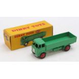 A Dinky Toys No. 420 Ford control lorry comprising of green cab and back with red hubs, housed in