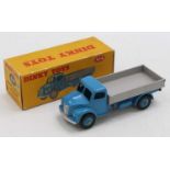 A Dinky Toys No. 414 rear tipping wagon comprising of blue cab and chassis with matching hubs and