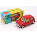 Corgi Toys No. 225 Austin Seven, comprising red body with yellow interior and spun hubs, housed in