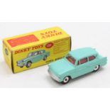 Dinky Toys No. 155 Ford Anglia comprising turquoise body with red interior, and spun hubs, in the
