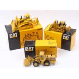 An NZG and Conrad boxed 1/50 scale Caterpillar diecast group to include an NZG No. 167 988F wheel