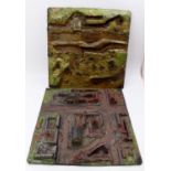 A pair of wargaming injection moulded diorama play bases, suitable for military war gaming, raised