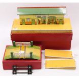 Two Hornby items: 1955-7 No.3 station, green roof, revised tin printing, with ramps (E) (BVG) with