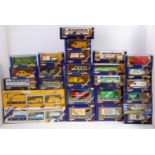 2 trays containing a collection of Corgi Toys modern issue commercial vehicles, with examples