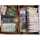A large collection of Airfix 1/32nd scale plastic military figures and accessories, with examples