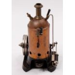 A Gamages of London, possibly Marklin vertical spirit fired steam engine, comprising of cast iron