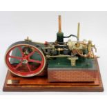 A well-engineered model of a Stationary Horizontal Live Steam Mill Engine, comprising of large