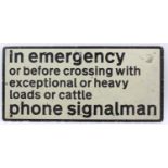 A late 20th century metal railway sign to read "In Emergency, or before Crossing with Exceptional or