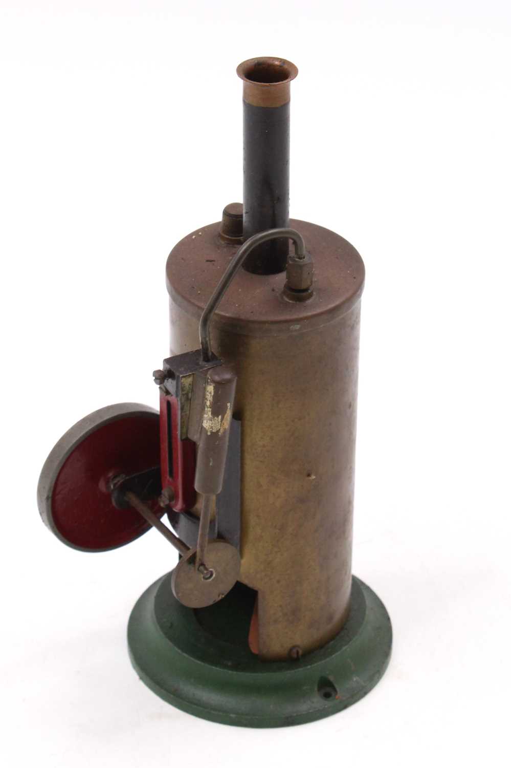 A Burmac Products circa 1947 vertical spirit fired steam engine on heavy weighted base, of usual