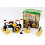 A Mamod Traction Engine and Trailer Set No. TWS1 comprising a yellow & black engine & trailer,