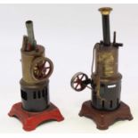 A pair of vertical spirit fired German live steam engines, the tallest 25cm, both of usual