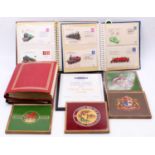 Four albums containing a quantity of railway and transport interest first day covers, together