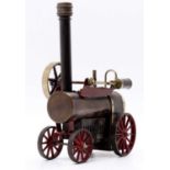 A Doll et Cie portable live steam engine, comprising of horizontal boiler with original burner,